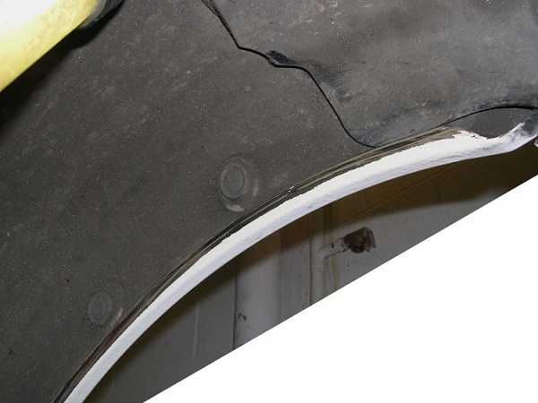 Evidence of tire rub on inside of e46 m3 rear fender lip