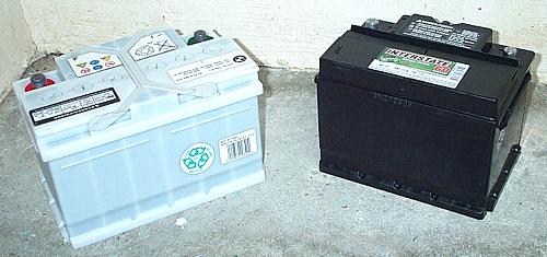 The smaller Interstate battery next to the stock battery from an E30 M3