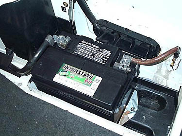 The smaller Interstate battery installed in an E30 chassis