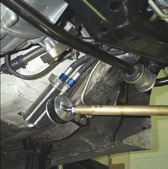 power steering cooler installed above suspension lollipop